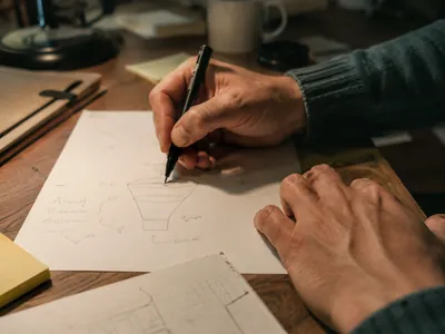 The senior growth architect assigned to your account, sketching the plan